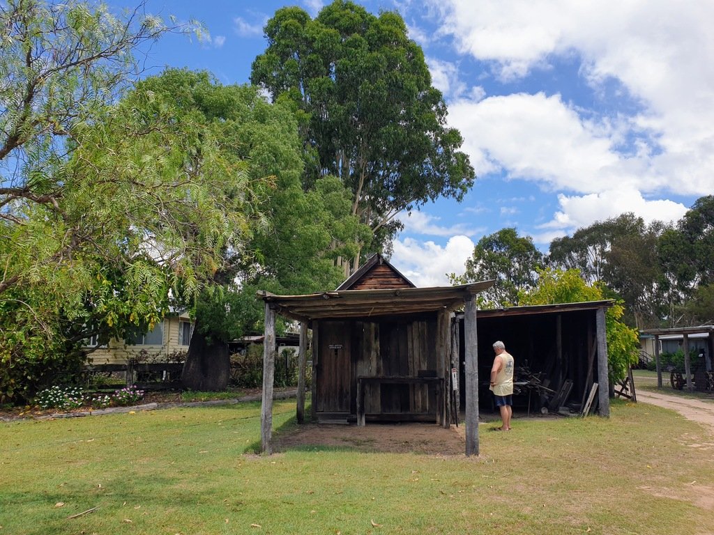 Boondooma Homestead Qld Historic post office building and bottle tree filled with cement to fix it from rotting