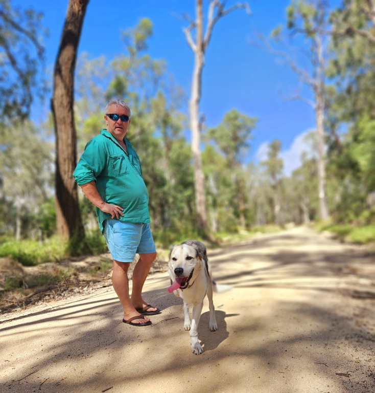 two people walking 3 legged dog 3 month farm sit around Australia Aussie house sitters