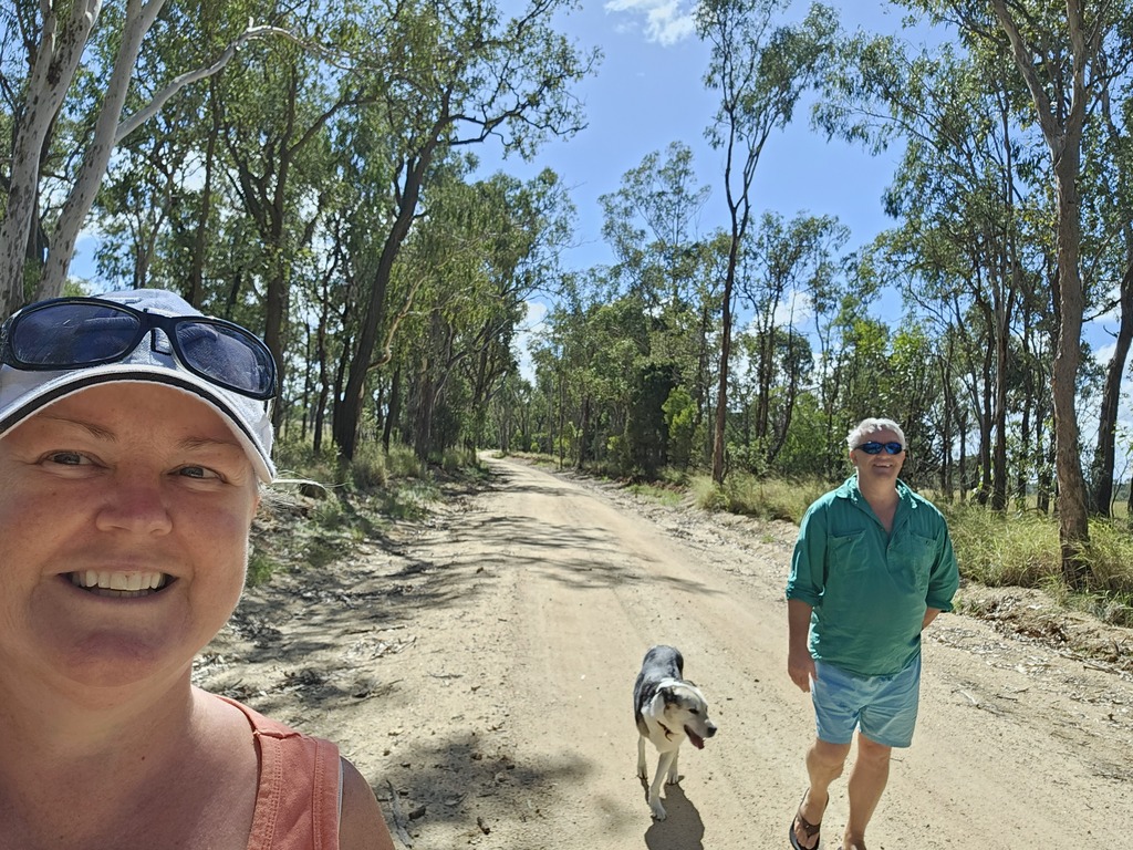 two people walking 3 legged dog 3 month farm sit around Australia Aussie house sitters