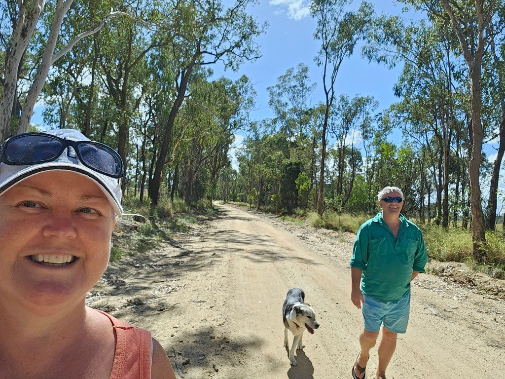 two people walking 3 legged dog 3 month farm sit around Australia Aussie house sitters