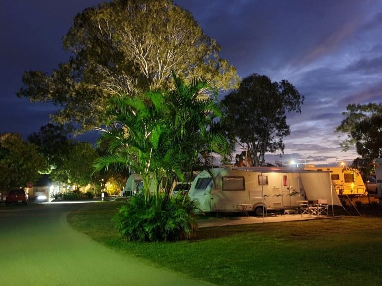 Big-4-helensvale-caravan parking RV sites grass sites sunset