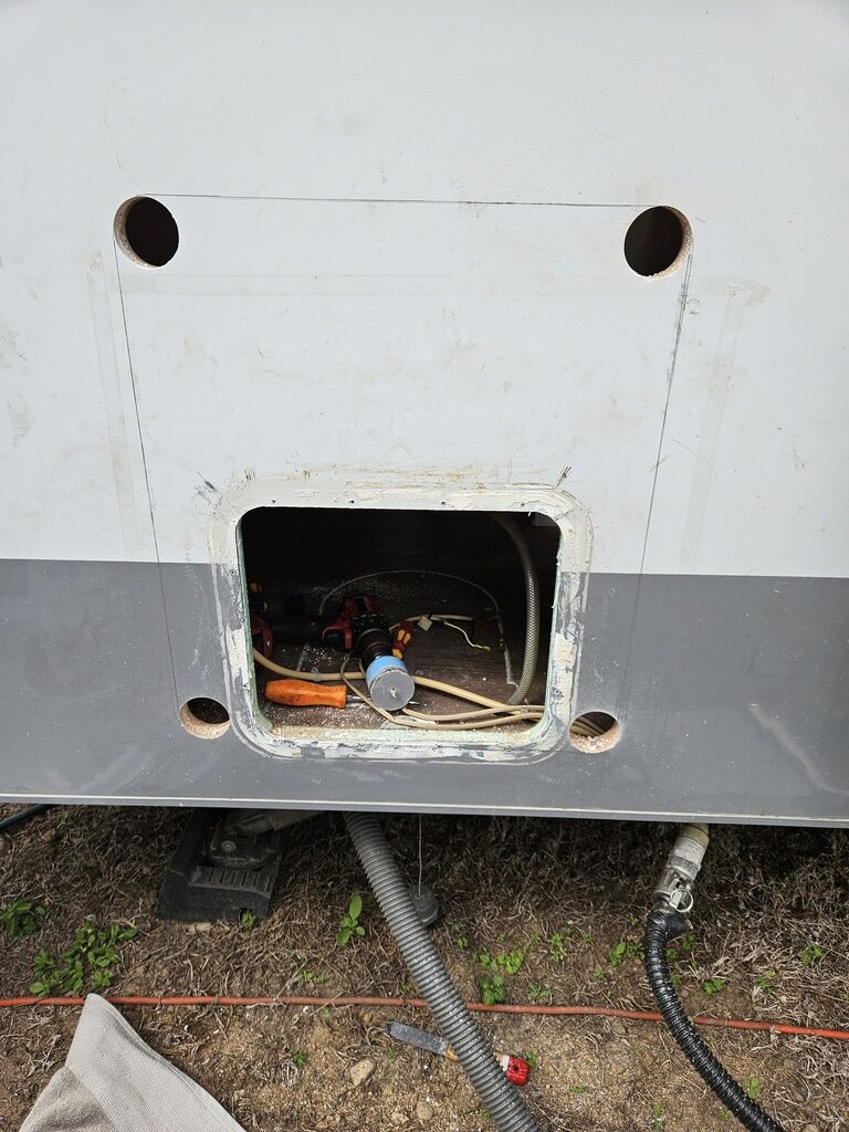 Door cut out for Natures Head Toilet in our caravan